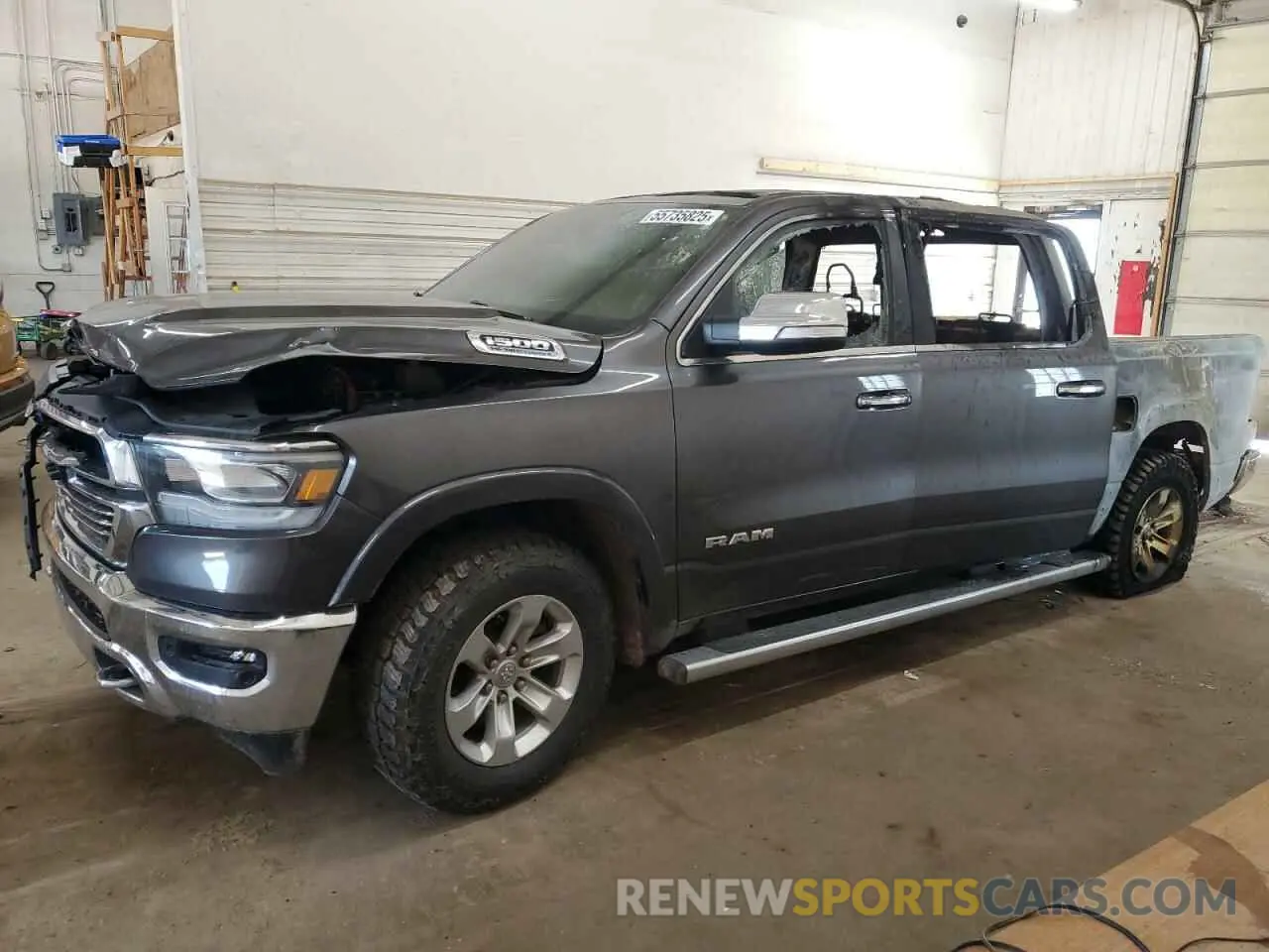 1 Photograph of a damaged car 1C6SRFJT0MN784447 RAM 1500 2021