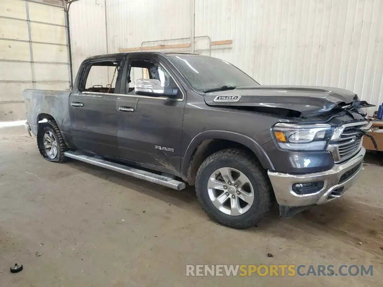 4 Photograph of a damaged car 1C6SRFJT0MN784447 RAM 1500 2021