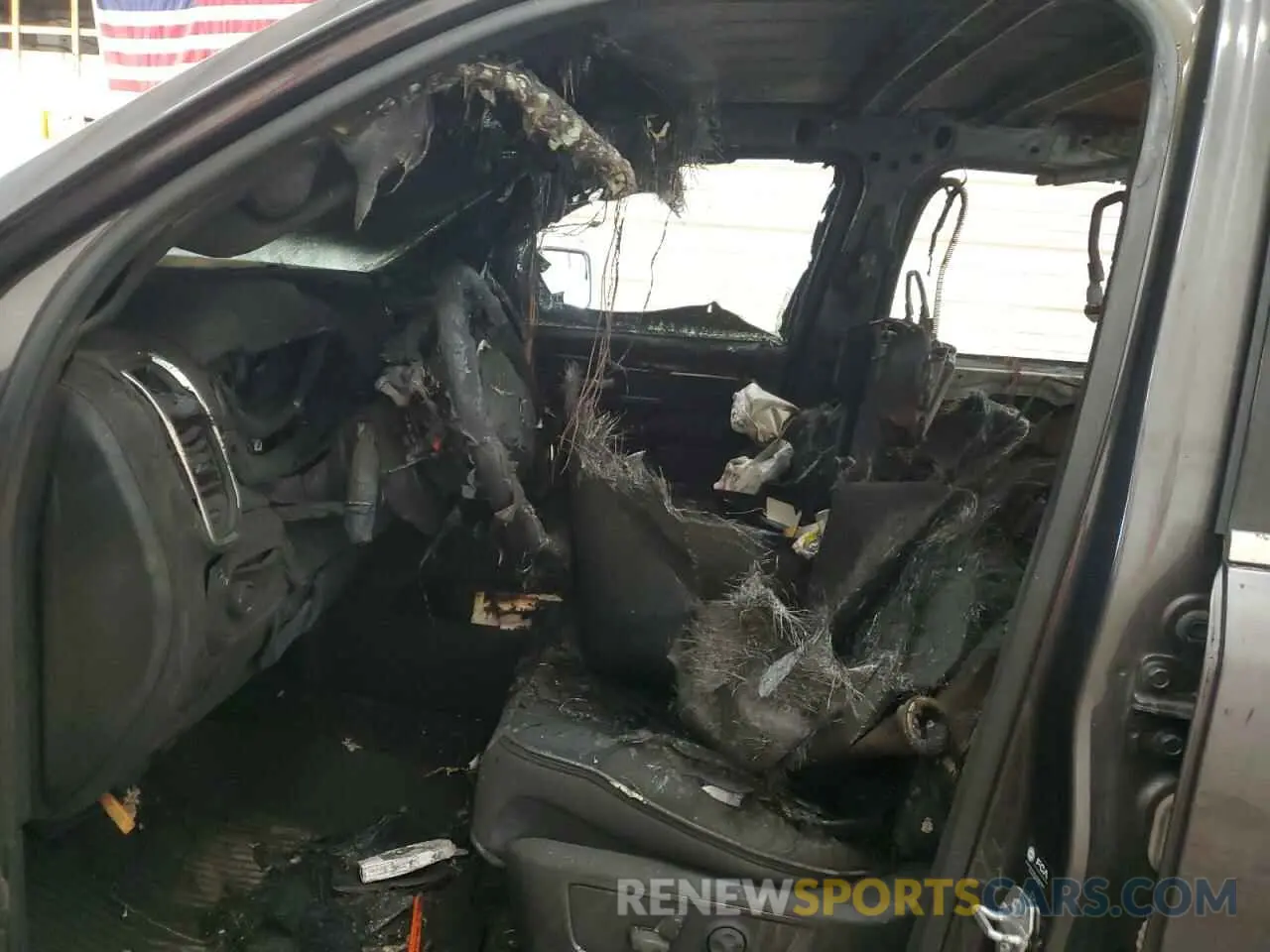 7 Photograph of a damaged car 1C6SRFJT0MN784447 RAM 1500 2021