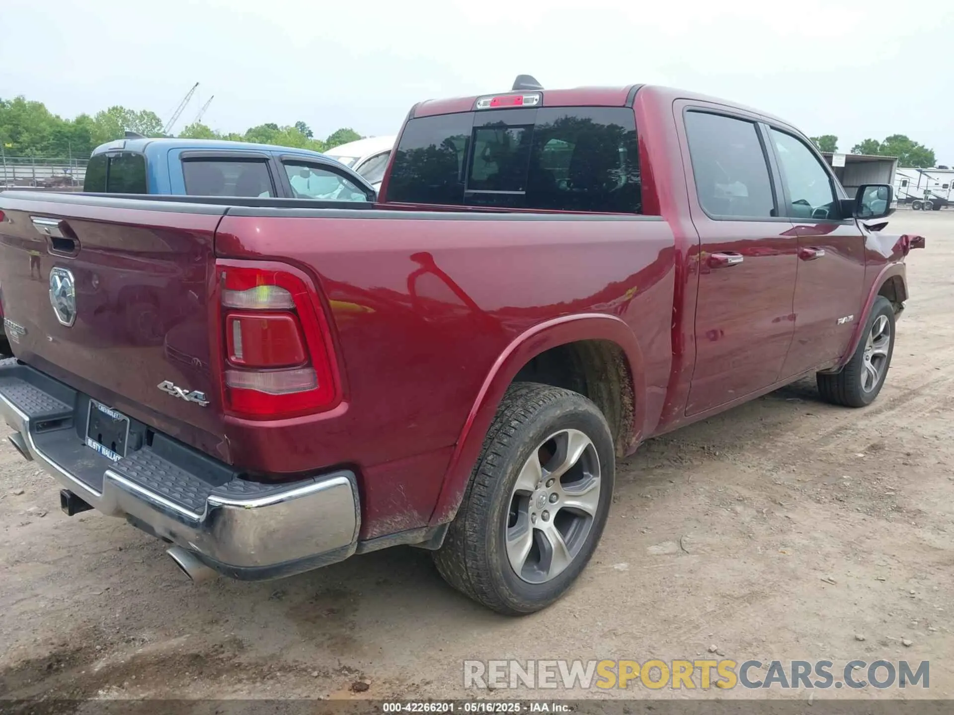 4 Photograph of a damaged car 1C6SRFJT0MN784724 RAM 1500 2021