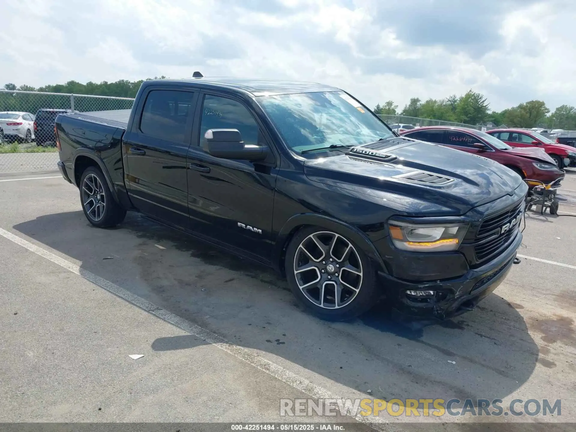 1 Photograph of a damaged car 1C6SRFJT1MN627705 RAM 1500 2021