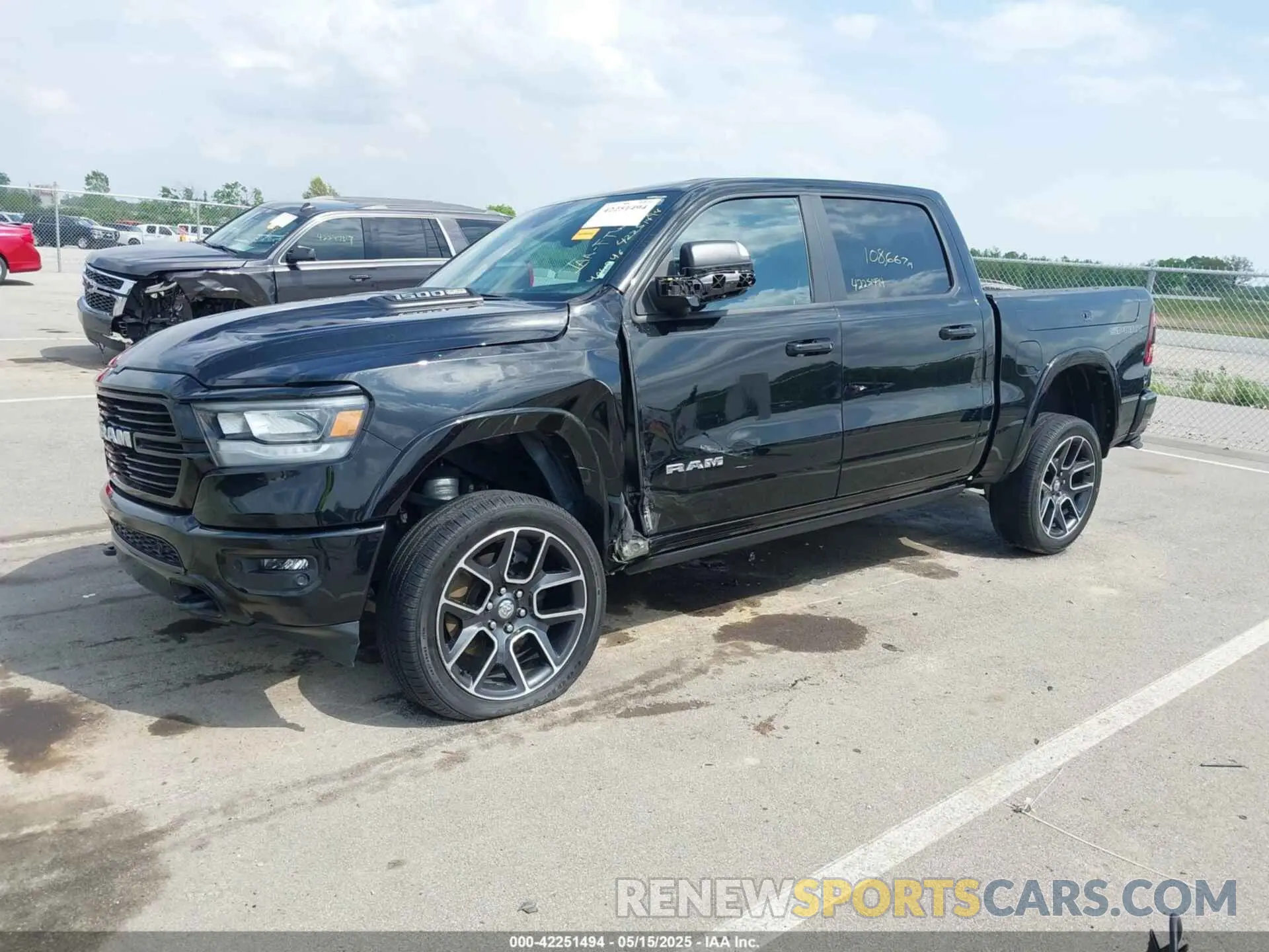 2 Photograph of a damaged car 1C6SRFJT1MN627705 RAM 1500 2021