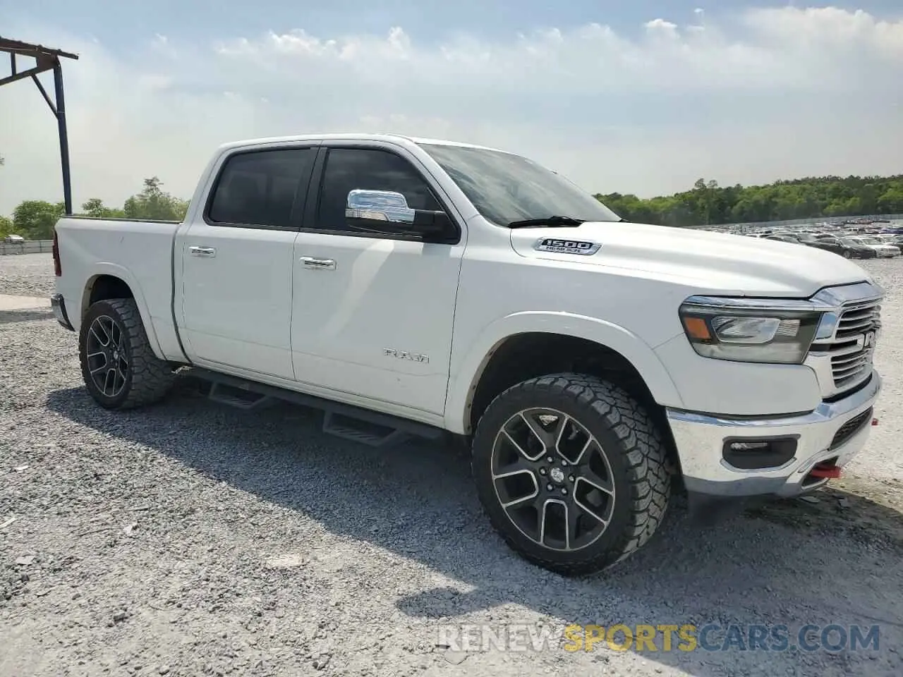 4 Photograph of a damaged car 1C6SRFJT1MN632614 RAM 1500 2021