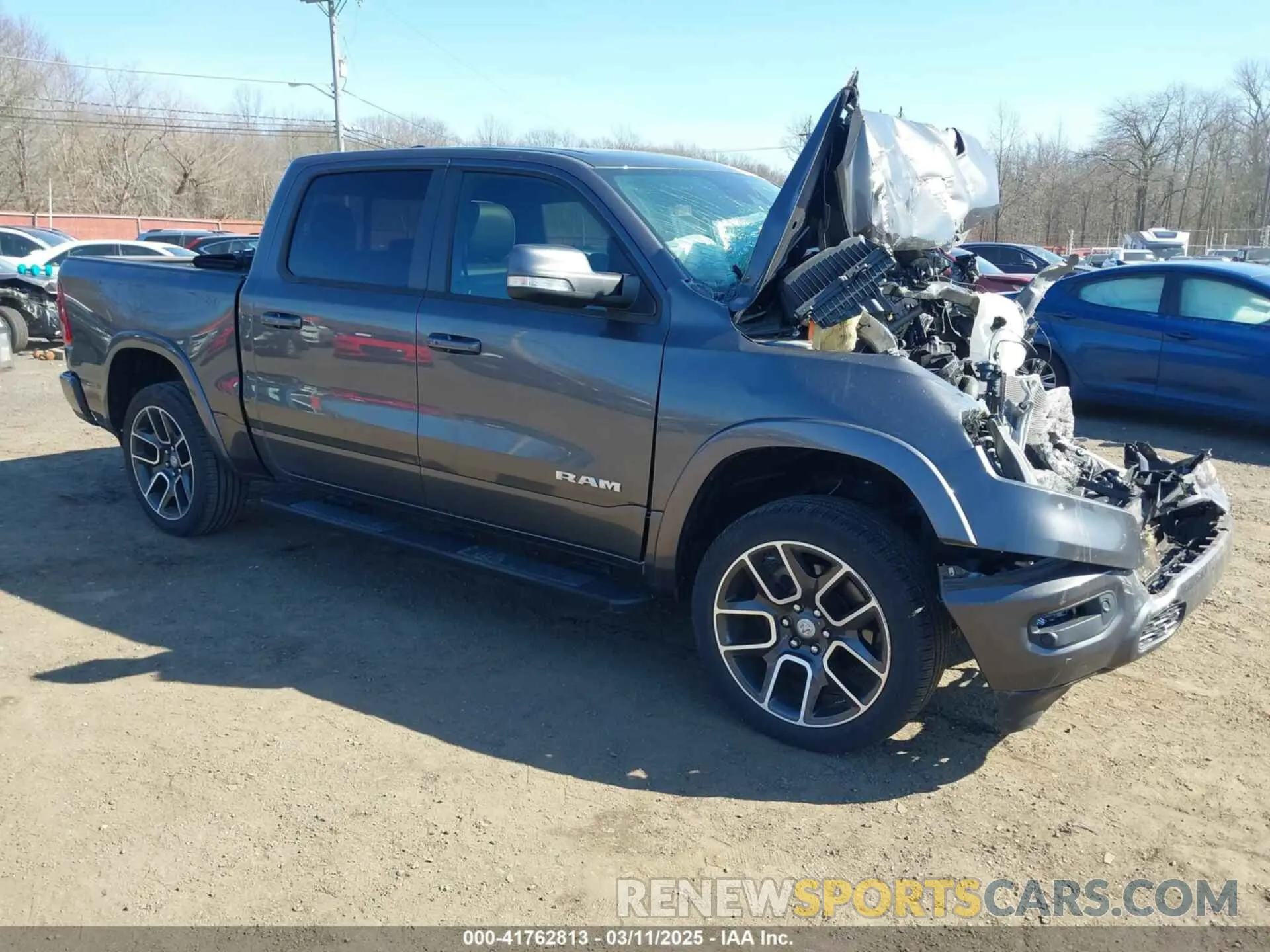 1 Photograph of a damaged car 1C6SRFJT1MN668982 RAM 1500 2021