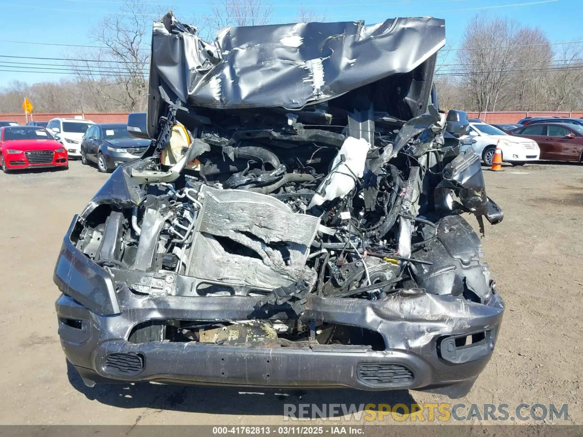 12 Photograph of a damaged car 1C6SRFJT1MN668982 RAM 1500 2021
