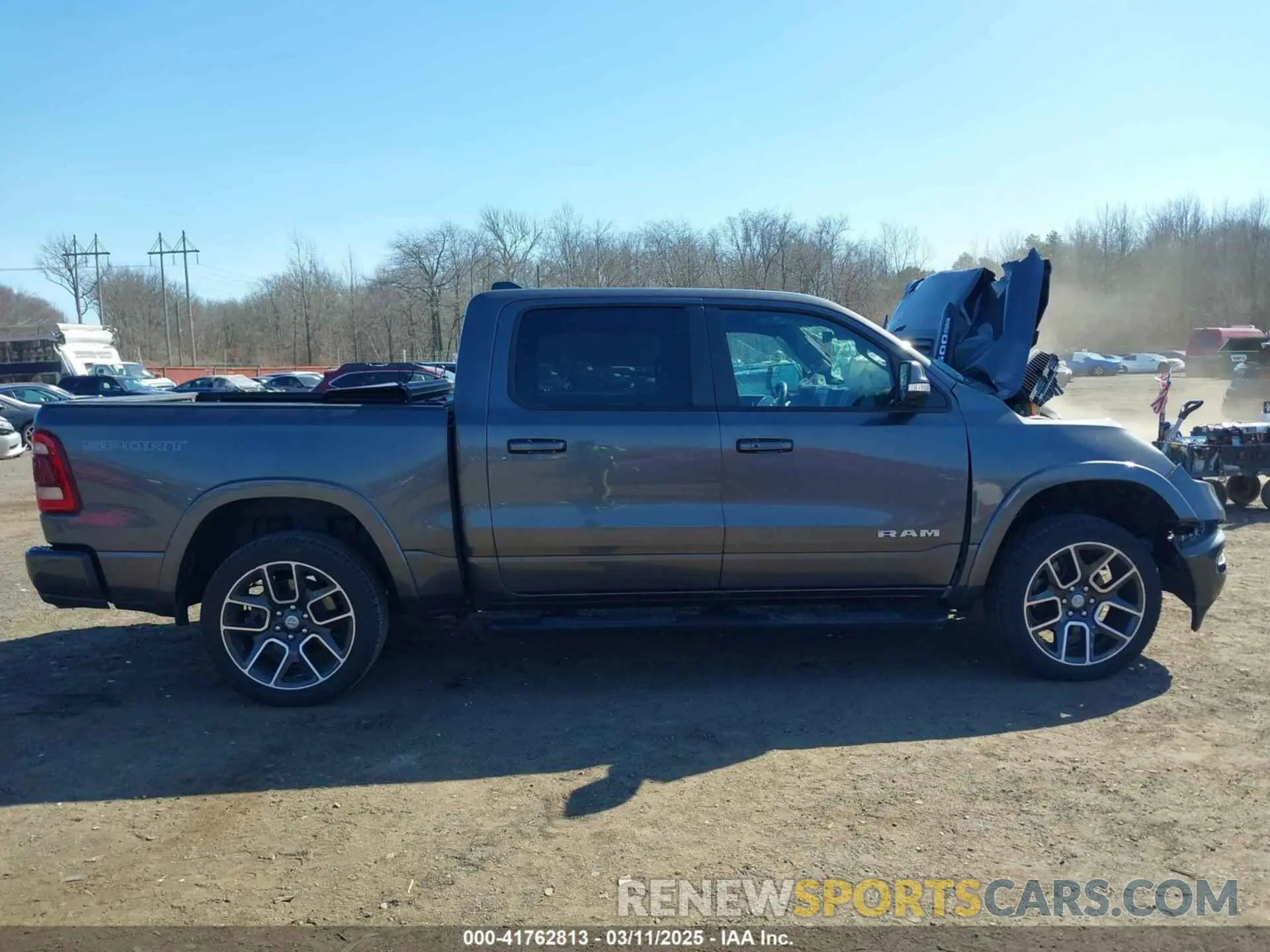 13 Photograph of a damaged car 1C6SRFJT1MN668982 RAM 1500 2021