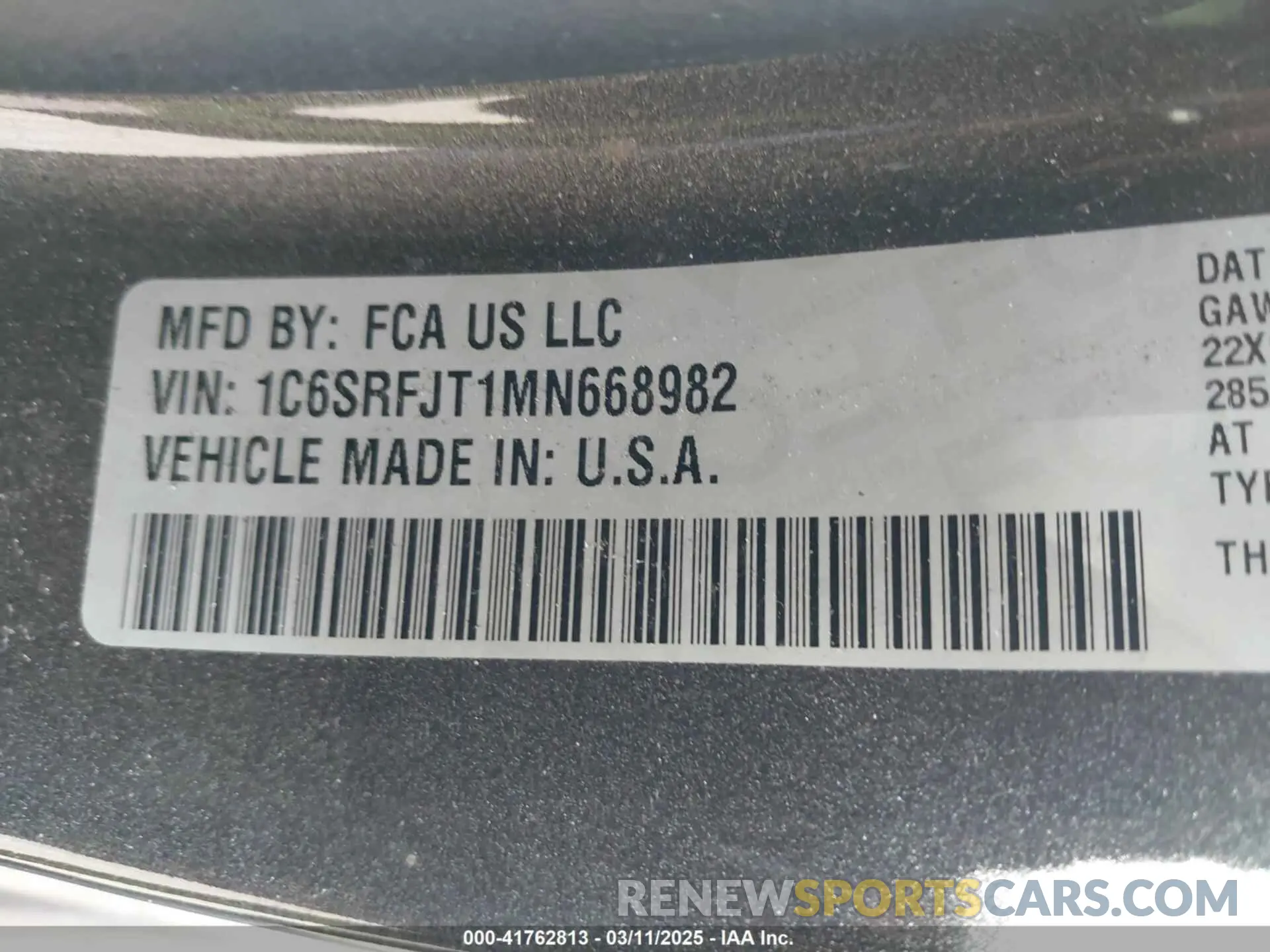 9 Photograph of a damaged car 1C6SRFJT1MN668982 RAM 1500 2021
