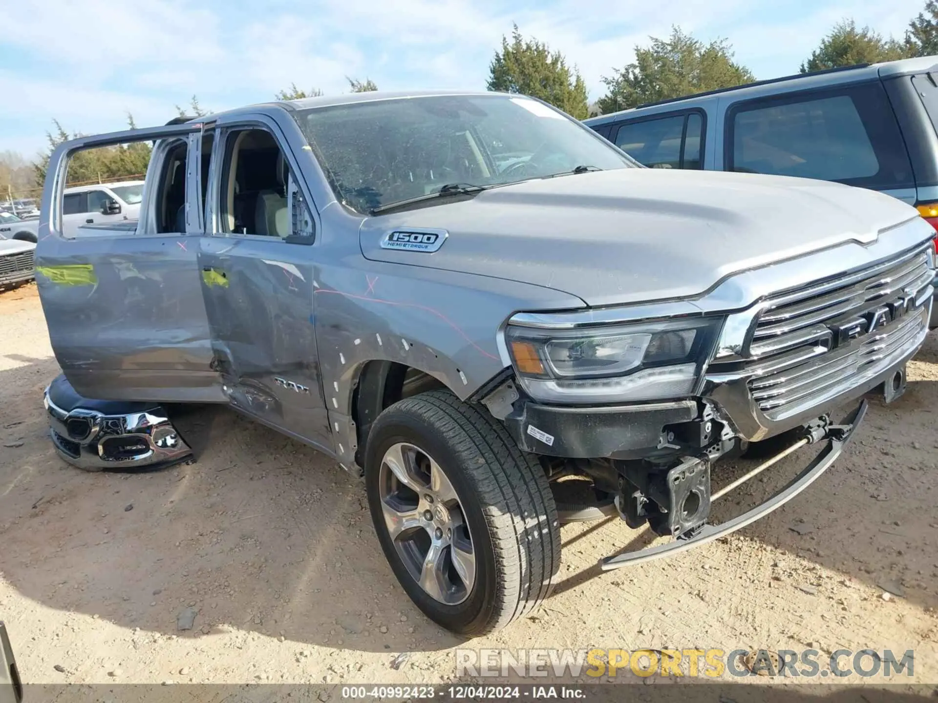 1 Photograph of a damaged car 1C6SRFJT1MN702466 RAM 1500 2021