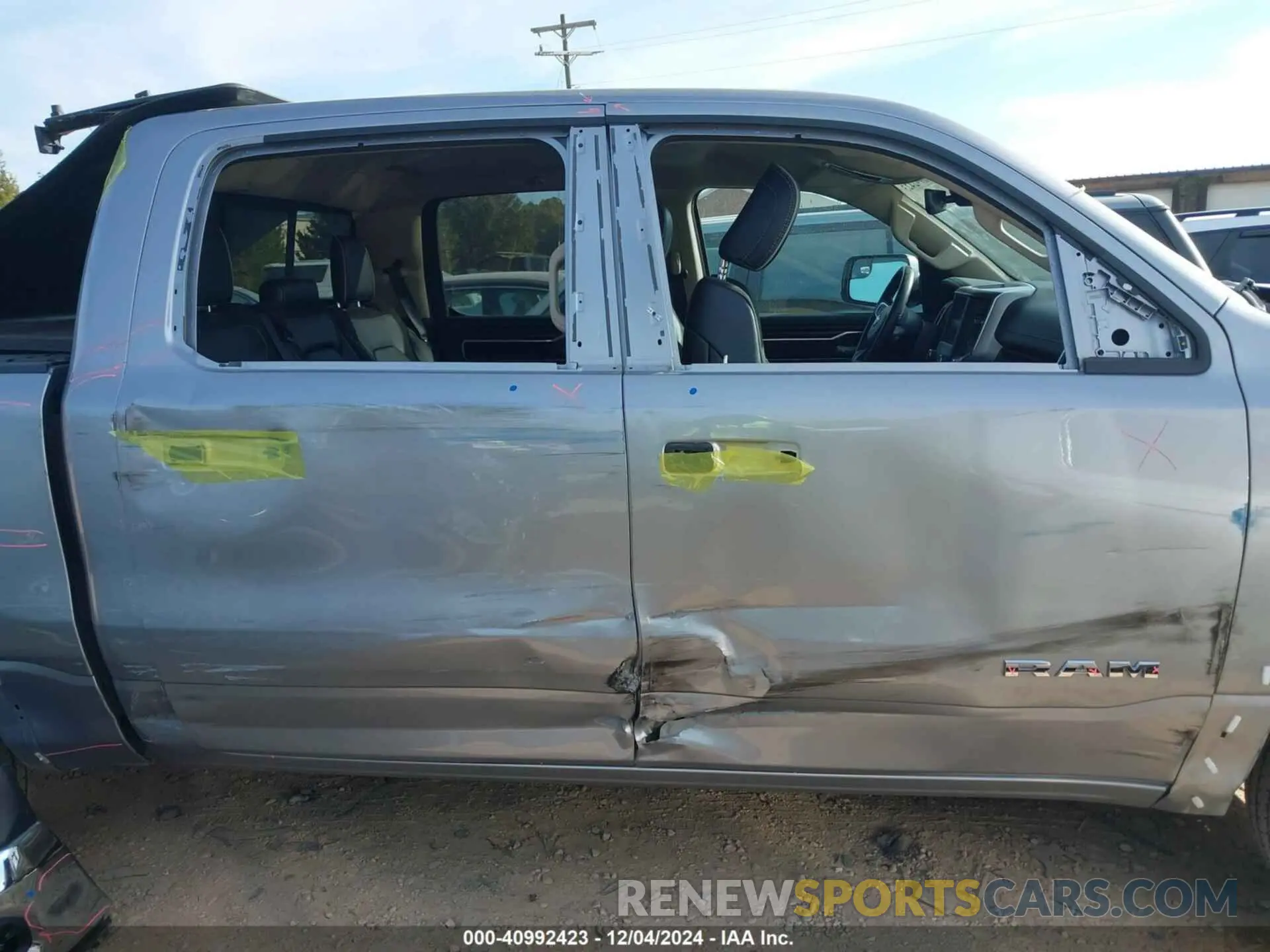 14 Photograph of a damaged car 1C6SRFJT1MN702466 RAM 1500 2021