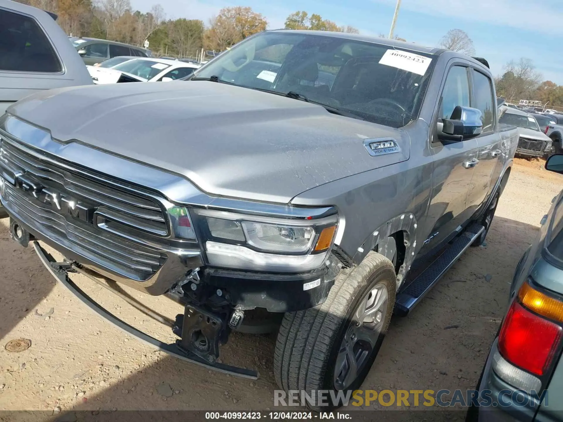 2 Photograph of a damaged car 1C6SRFJT1MN702466 RAM 1500 2021