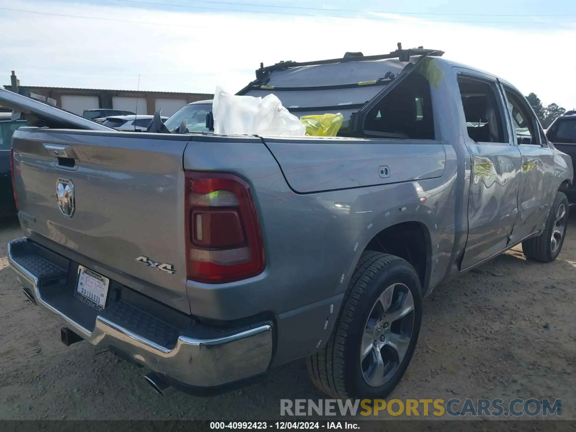 4 Photograph of a damaged car 1C6SRFJT1MN702466 RAM 1500 2021