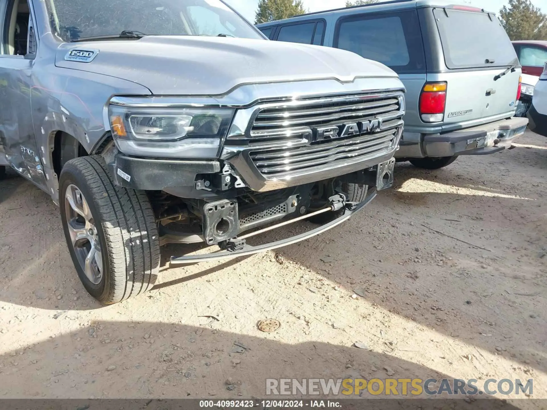 6 Photograph of a damaged car 1C6SRFJT1MN702466 RAM 1500 2021