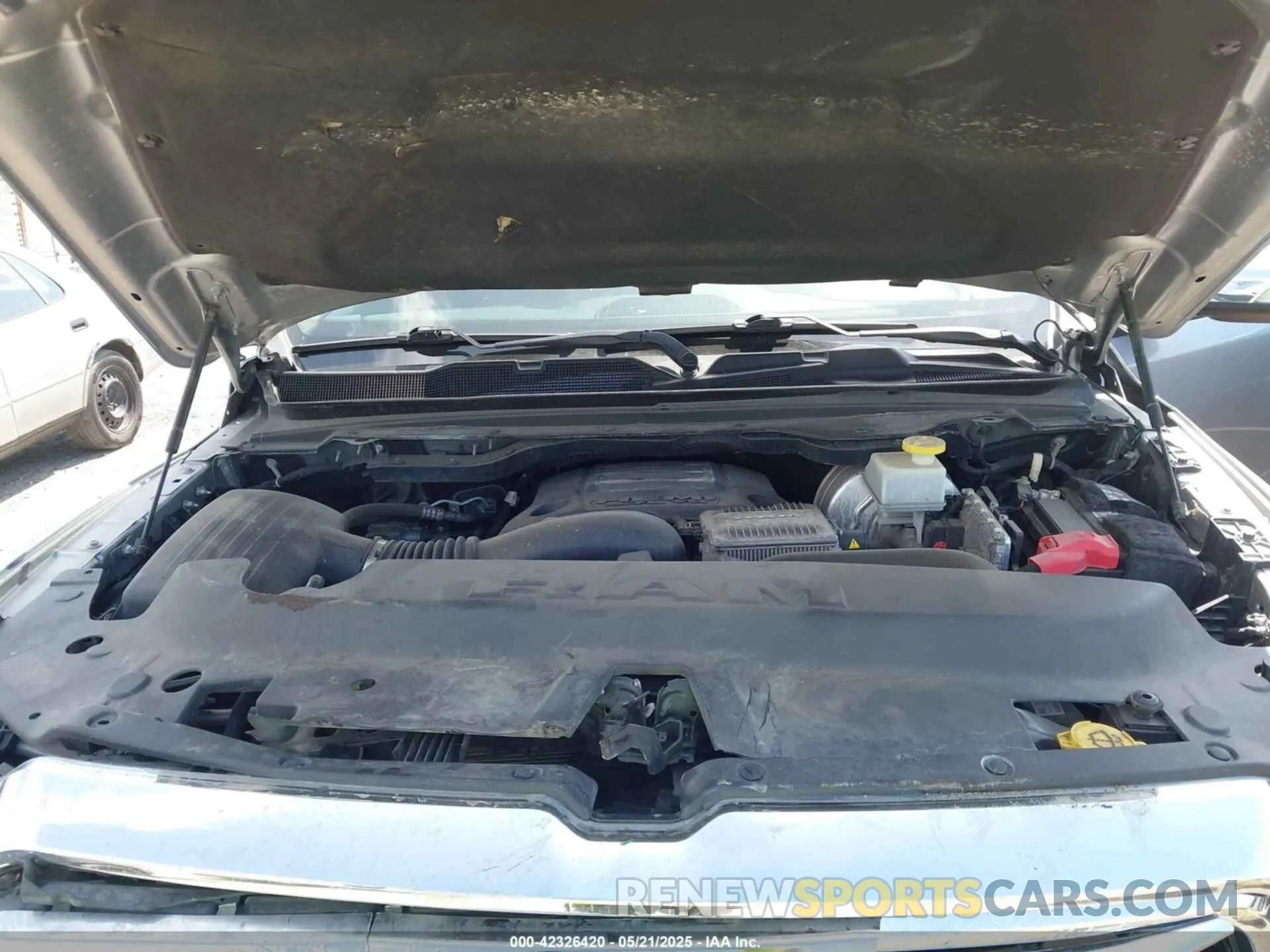 10 Photograph of a damaged car 1C6SRFJT1MN719168 RAM 1500 2021