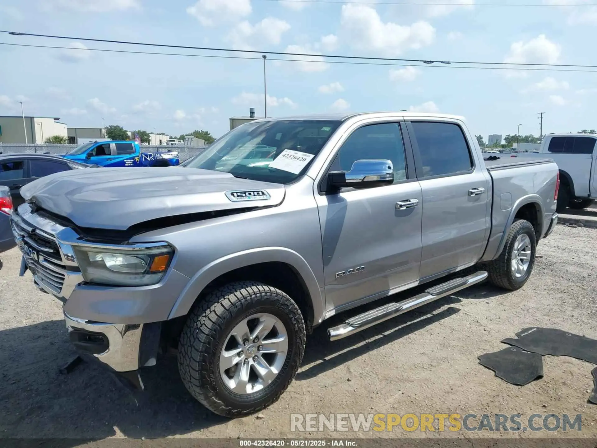 14 Photograph of a damaged car 1C6SRFJT1MN719168 RAM 1500 2021