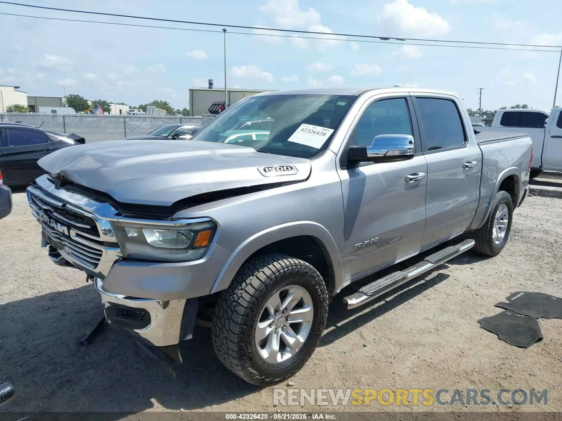 2 Photograph of a damaged car 1C6SRFJT1MN719168 RAM 1500 2021