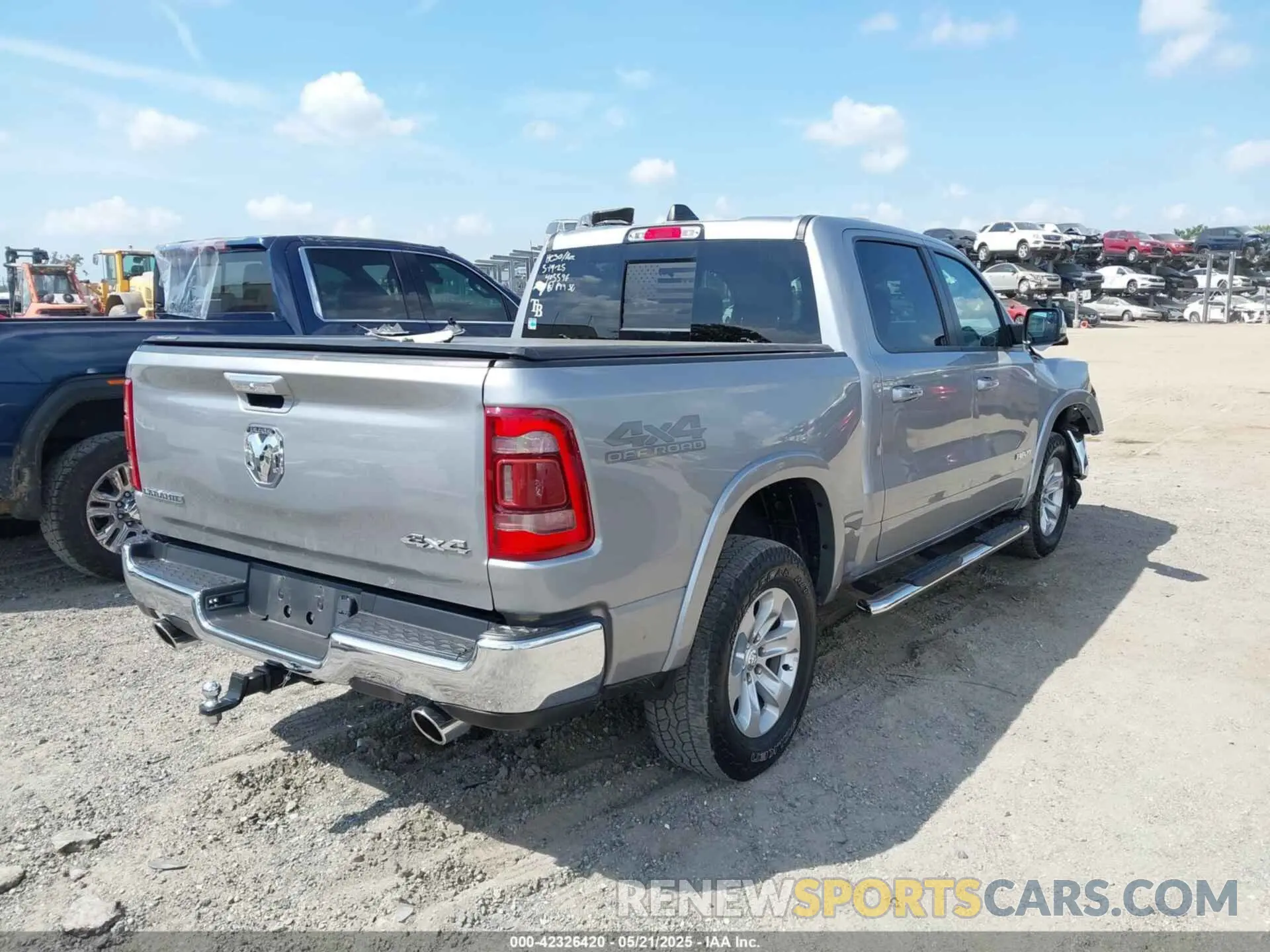 4 Photograph of a damaged car 1C6SRFJT1MN719168 RAM 1500 2021