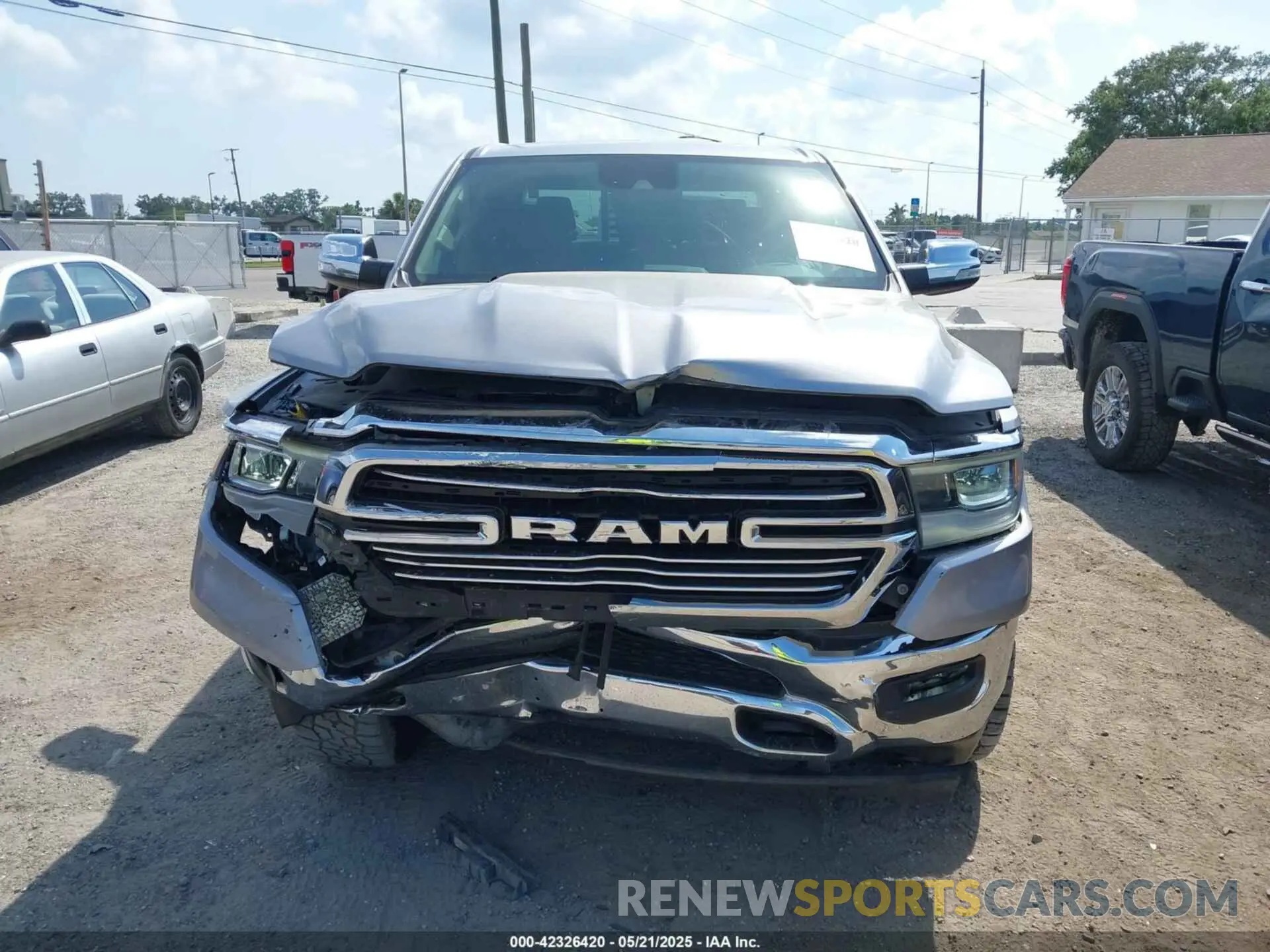 6 Photograph of a damaged car 1C6SRFJT1MN719168 RAM 1500 2021