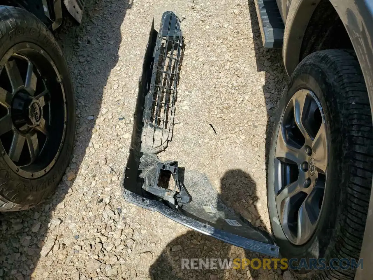 12 Photograph of a damaged car 1C6SRFJT1MN770377 RAM 1500 2021