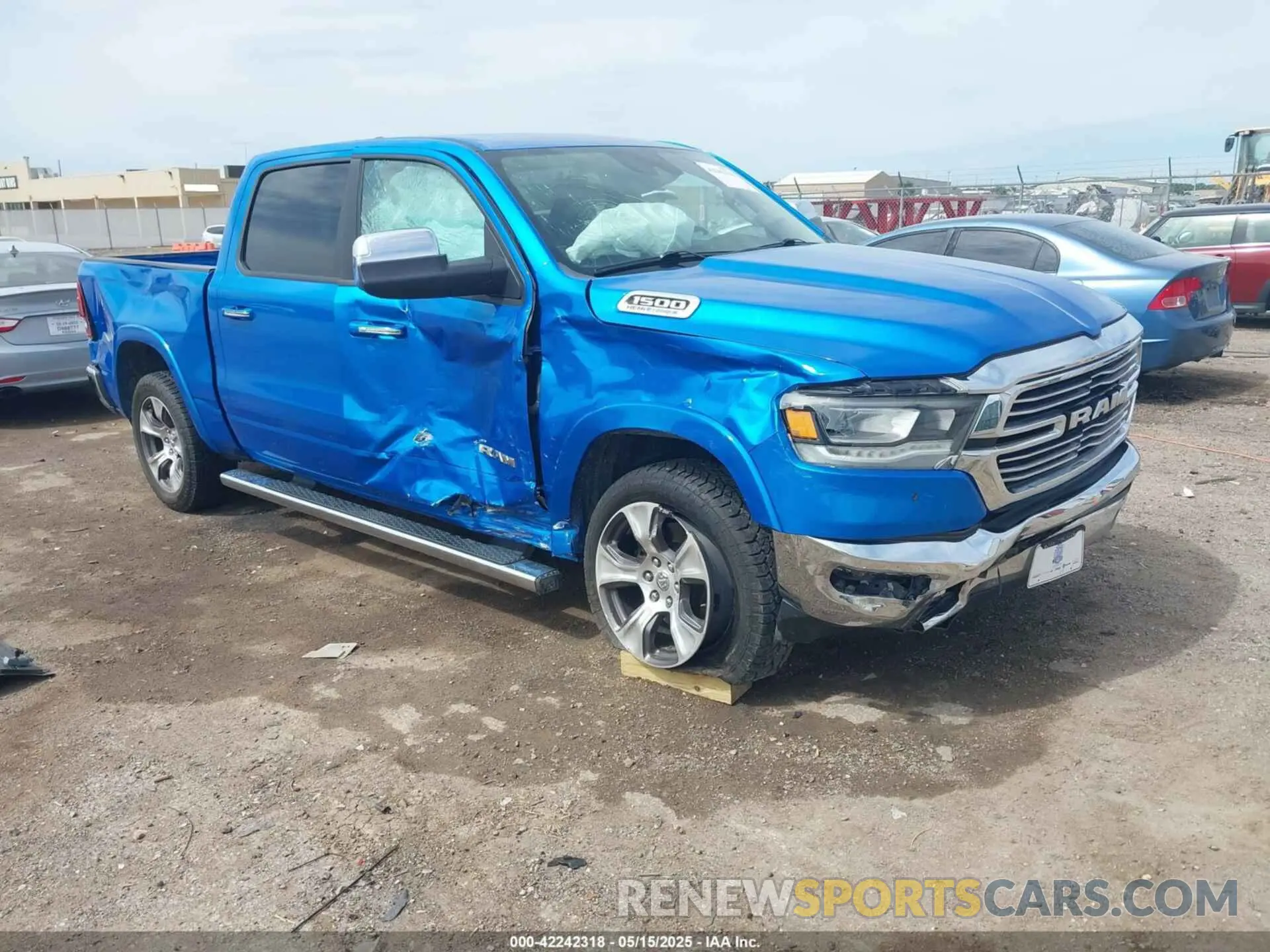 1 Photograph of a damaged car 1C6SRFJT1MN774879 RAM 1500 2021