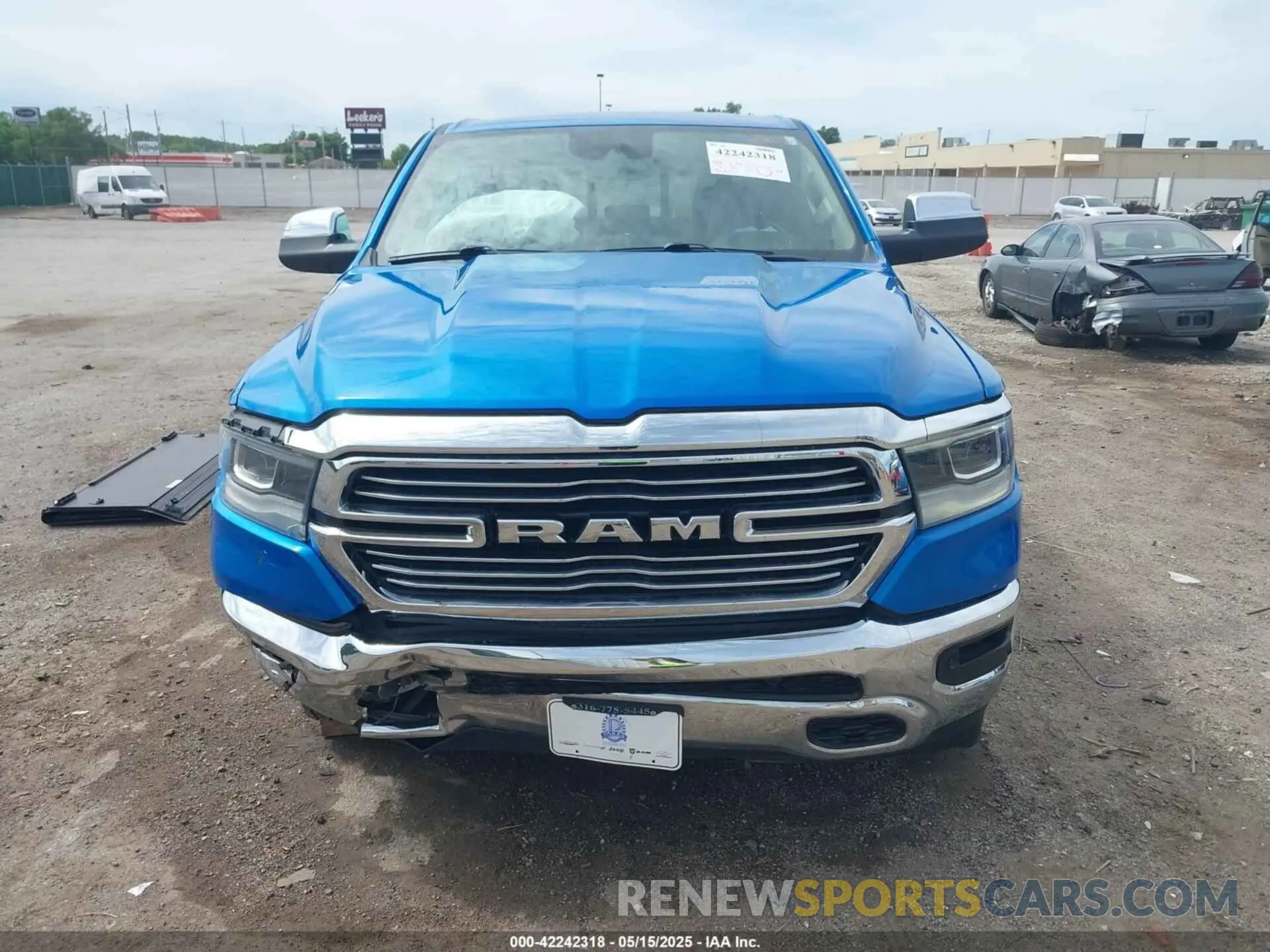 13 Photograph of a damaged car 1C6SRFJT1MN774879 RAM 1500 2021