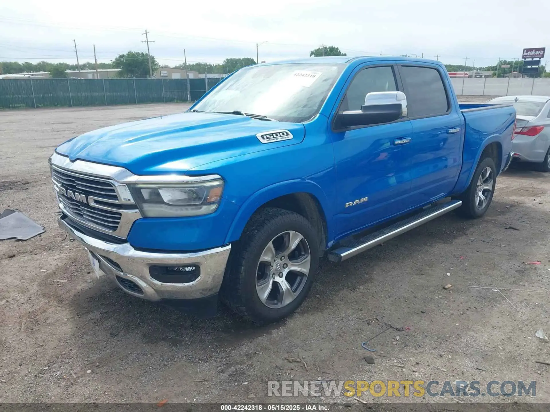 2 Photograph of a damaged car 1C6SRFJT1MN774879 RAM 1500 2021