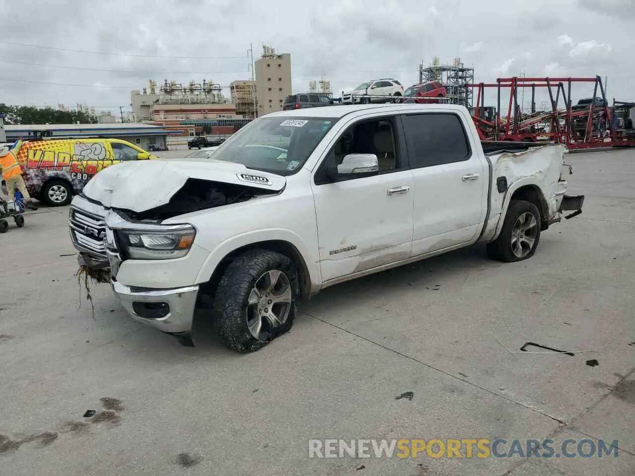 1 Photograph of a damaged car 1C6SRFJT1MN779208 RAM 1500 2021