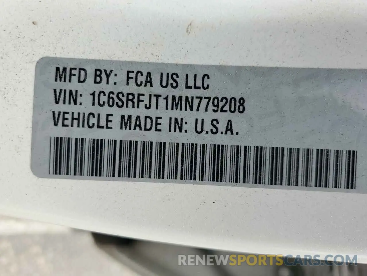 12 Photograph of a damaged car 1C6SRFJT1MN779208 RAM 1500 2021