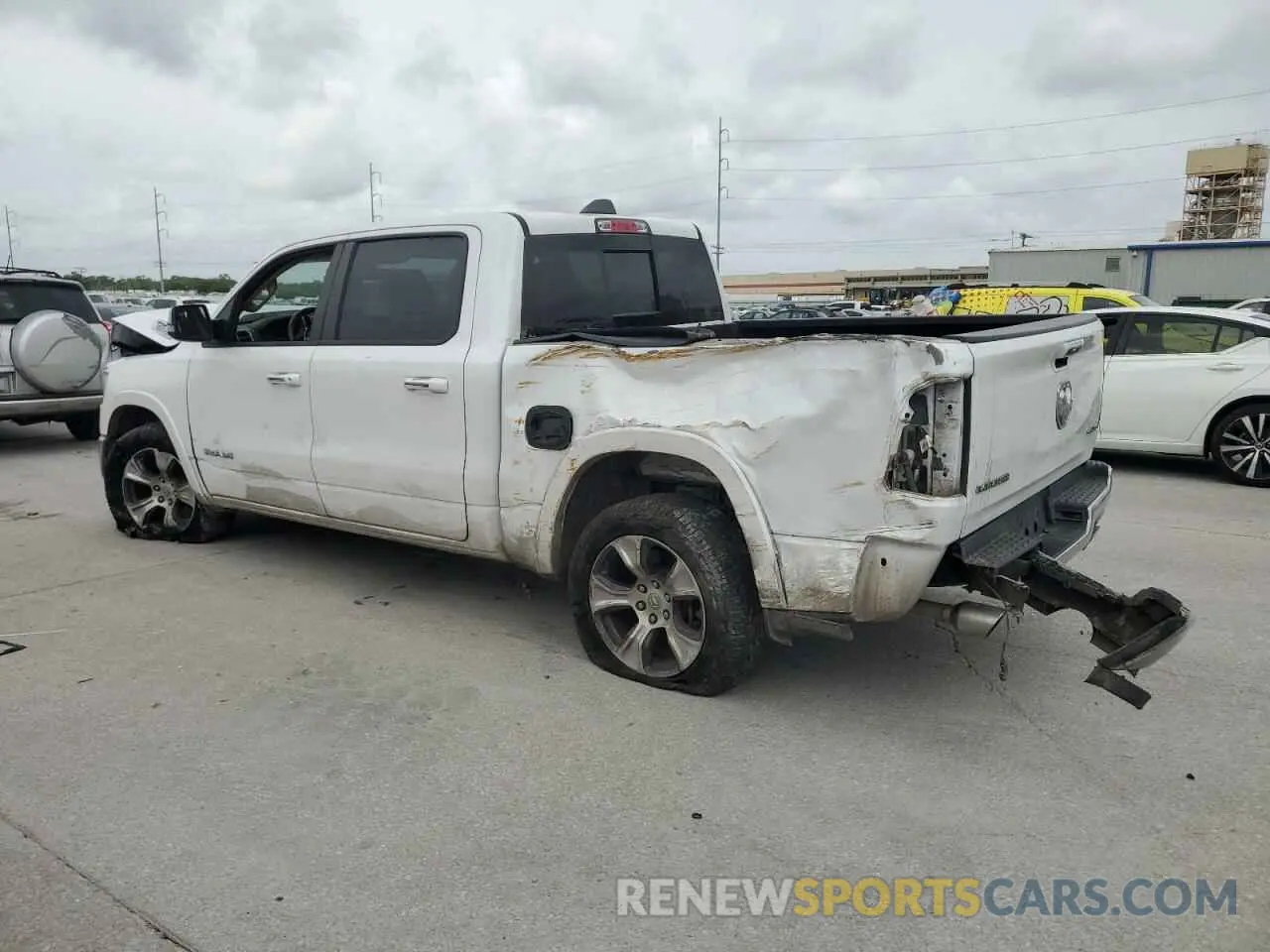 2 Photograph of a damaged car 1C6SRFJT1MN779208 RAM 1500 2021