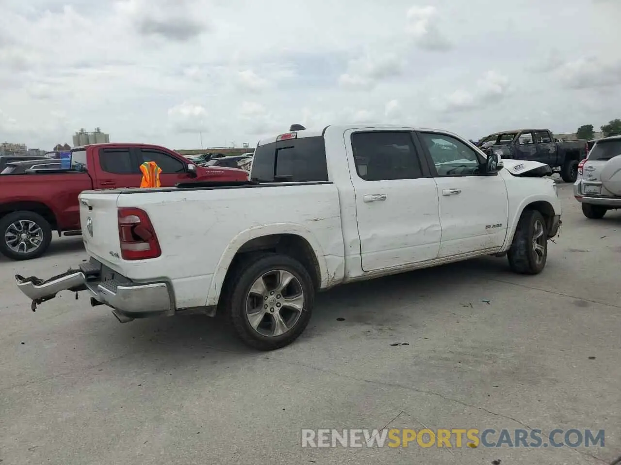 3 Photograph of a damaged car 1C6SRFJT1MN779208 RAM 1500 2021