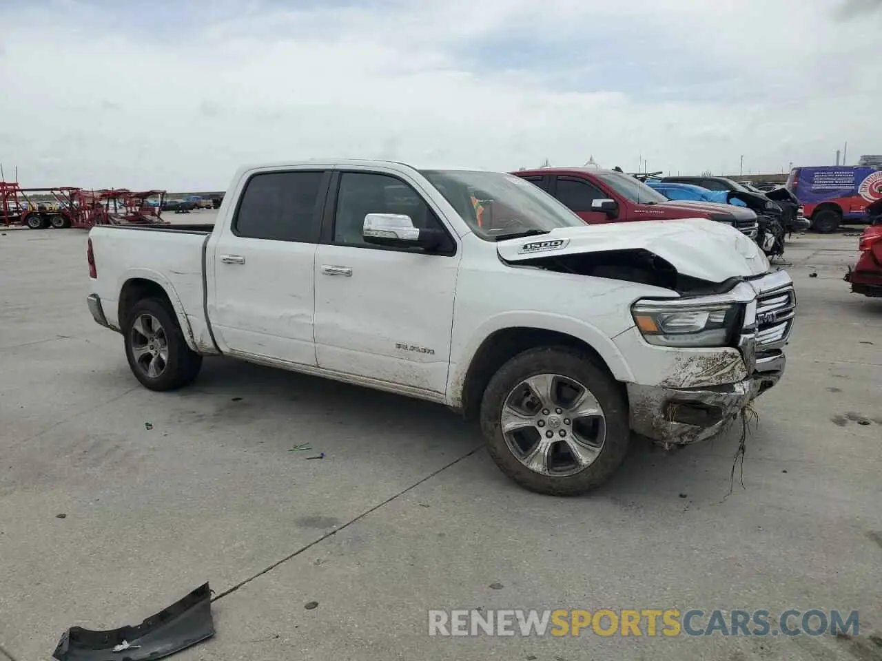 4 Photograph of a damaged car 1C6SRFJT1MN779208 RAM 1500 2021