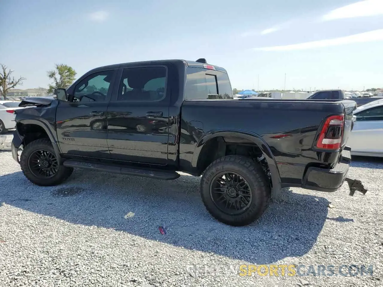 2 Photograph of a damaged car 1C6SRFJT1MN823126 RAM 1500 2021