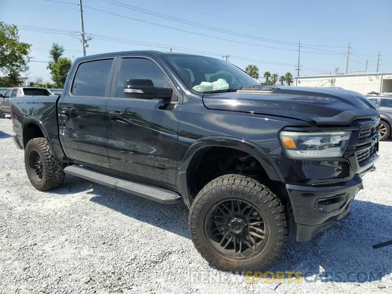 4 Photograph of a damaged car 1C6SRFJT1MN823126 RAM 1500 2021