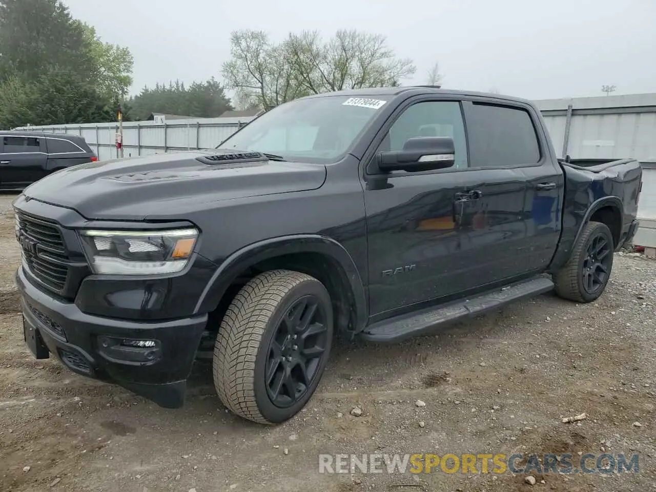 1 Photograph of a damaged car 1C6SRFJT2MN526883 RAM 1500 2021