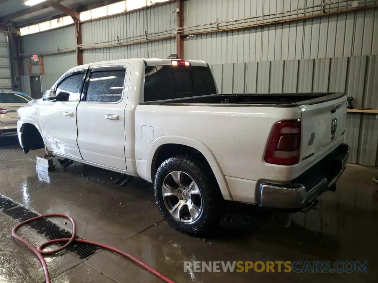 2 Photograph of a damaged car 1C6SRFJT2MN625431 RAM 1500 2021