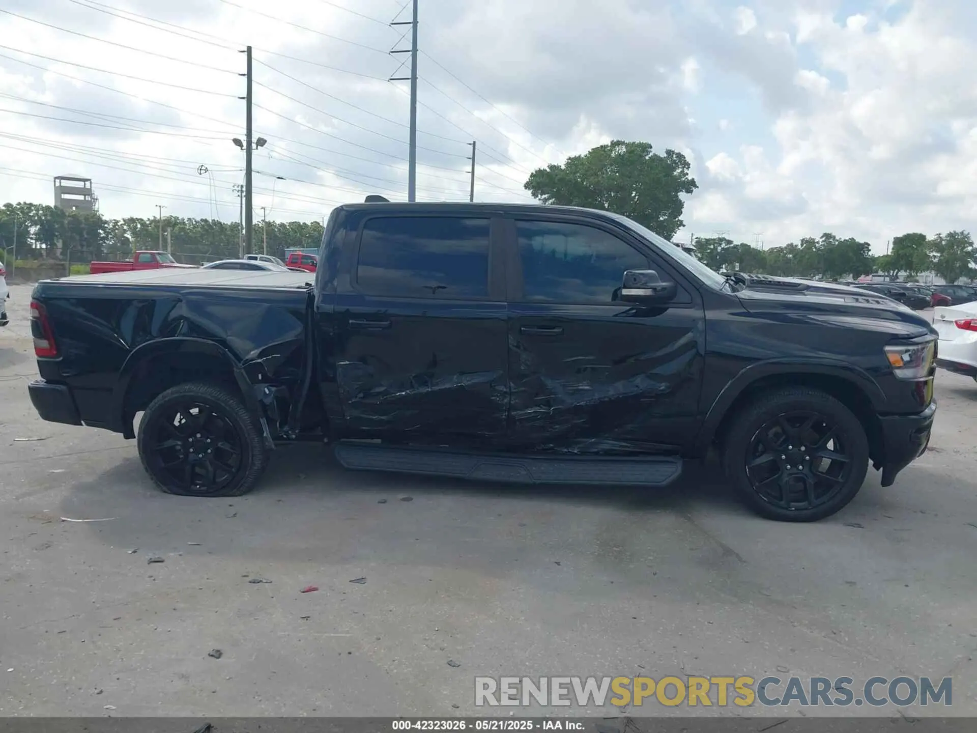13 Photograph of a damaged car 1C6SRFJT3MN520395 RAM 1500 2021