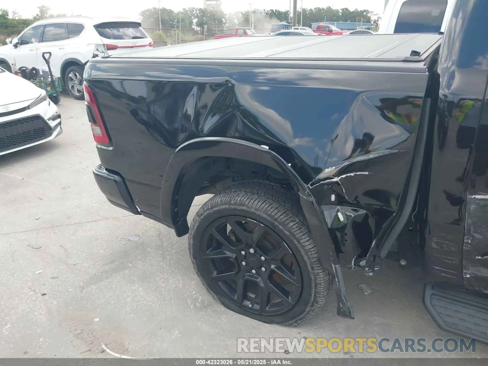 19 Photograph of a damaged car 1C6SRFJT3MN520395 RAM 1500 2021