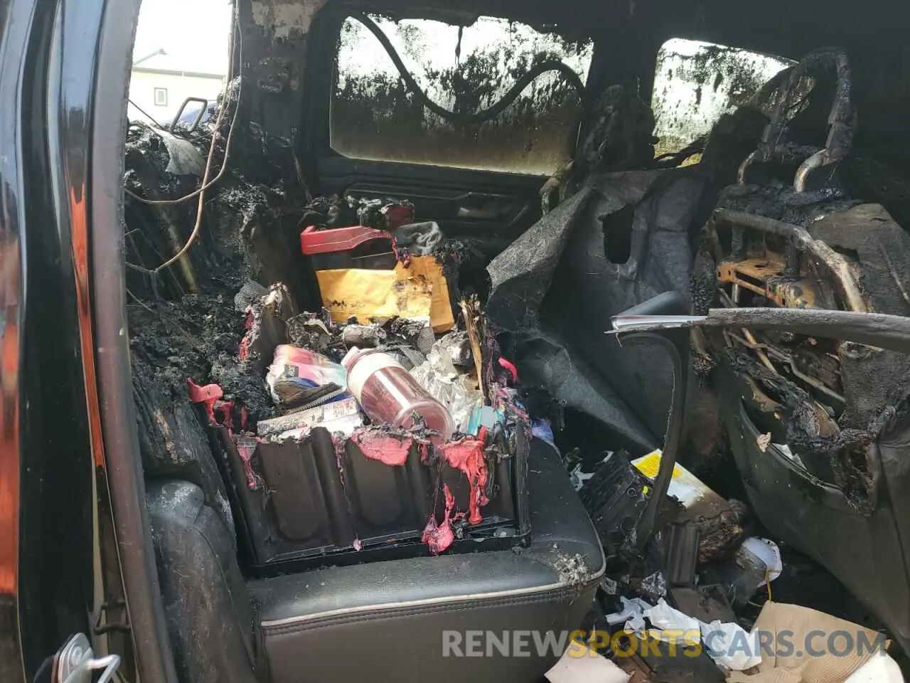 10 Photograph of a damaged car 1C6SRFJT3MN649527 RAM 1500 2021