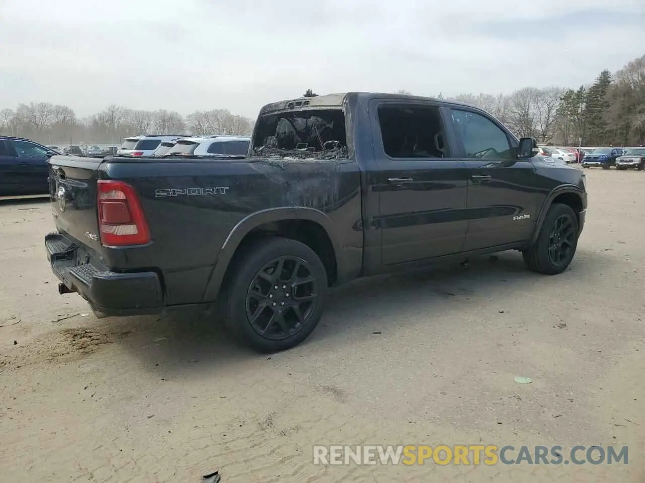 3 Photograph of a damaged car 1C6SRFJT3MN649527 RAM 1500 2021