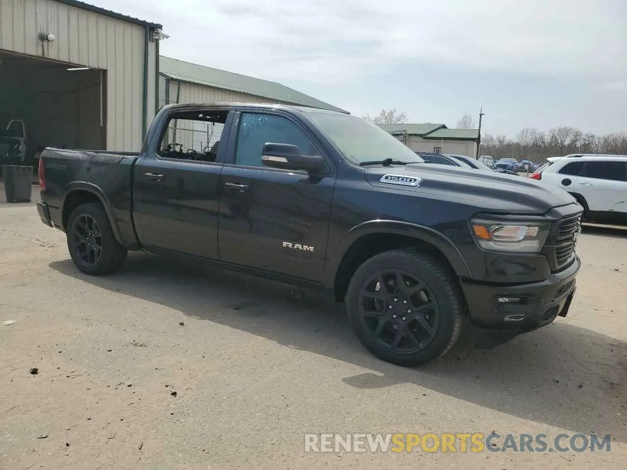 4 Photograph of a damaged car 1C6SRFJT3MN649527 RAM 1500 2021