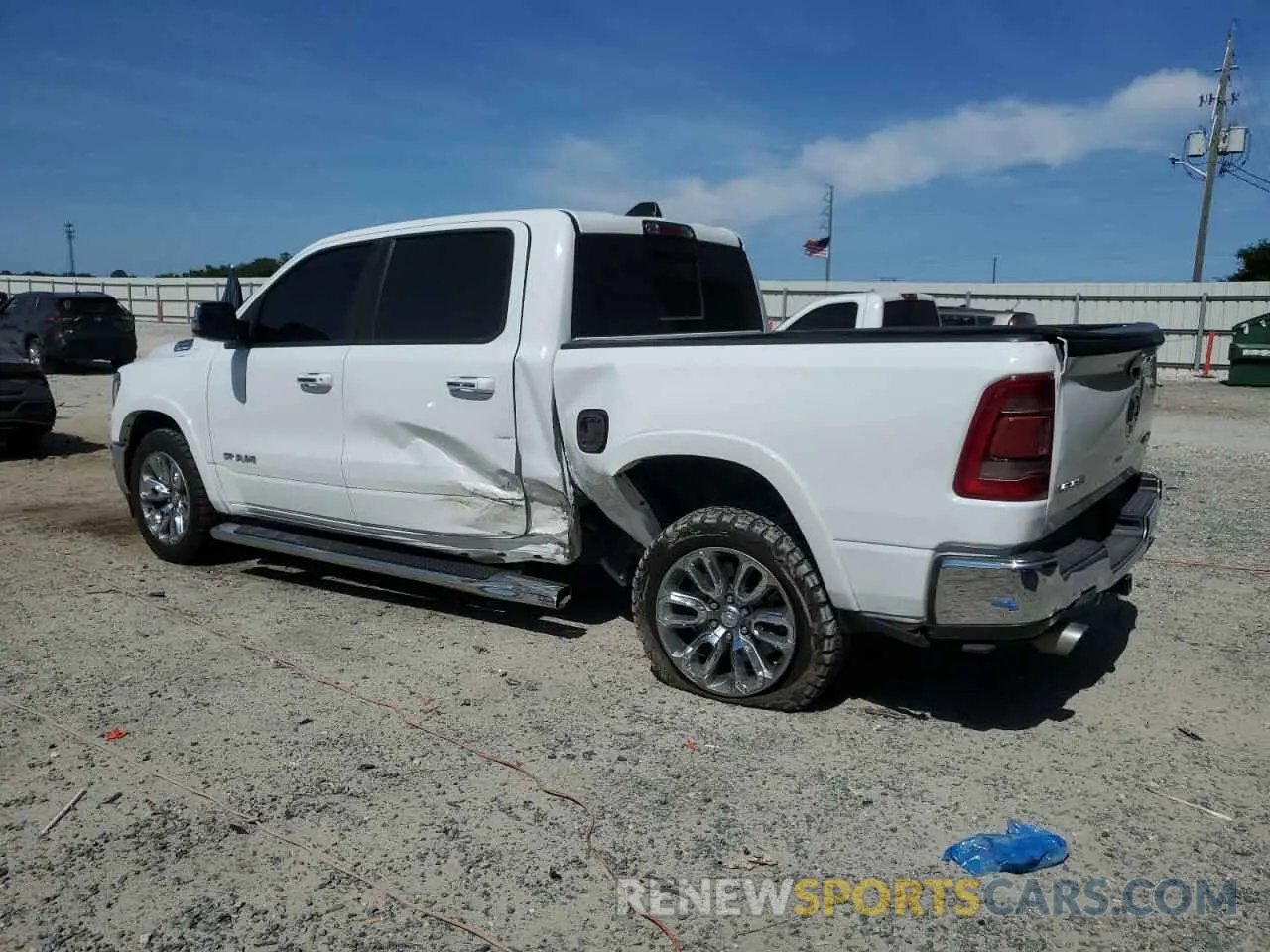 2 Photograph of a damaged car 1C6SRFJT3MN654873 RAM 1500 2021