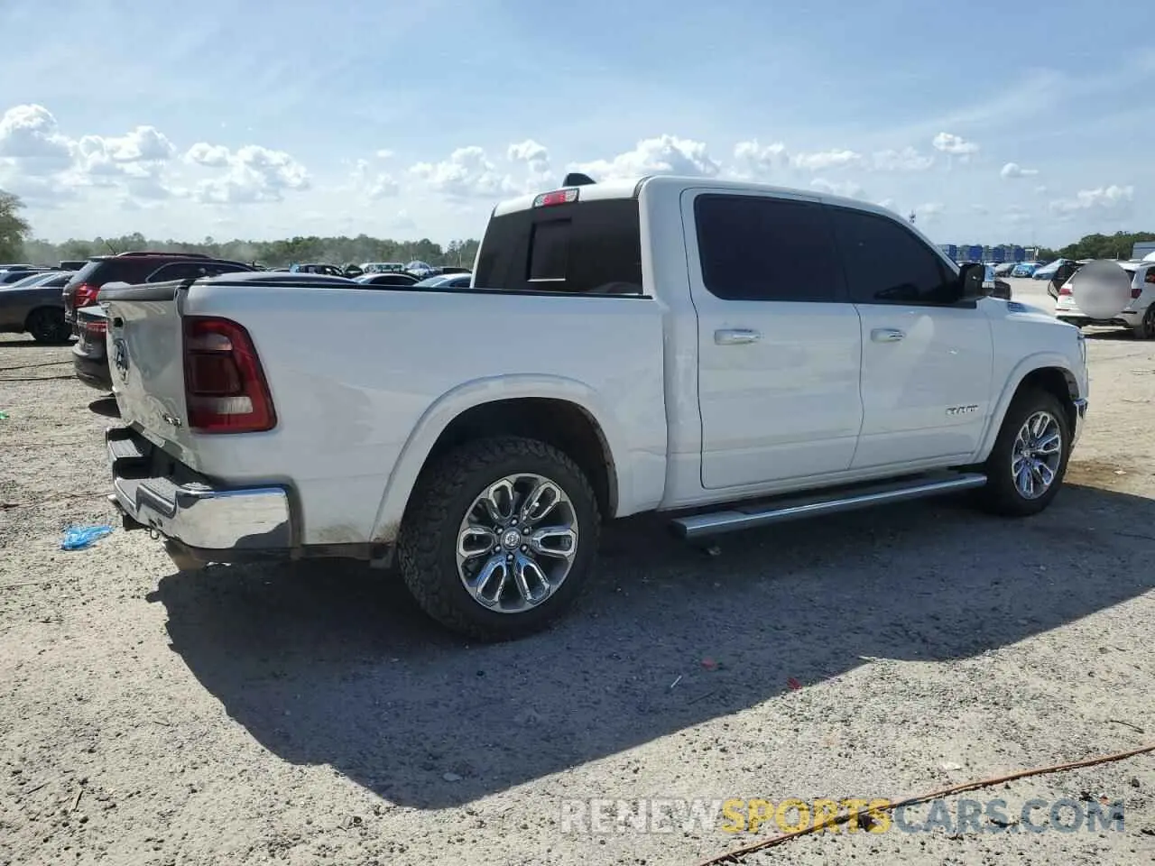 3 Photograph of a damaged car 1C6SRFJT3MN654873 RAM 1500 2021