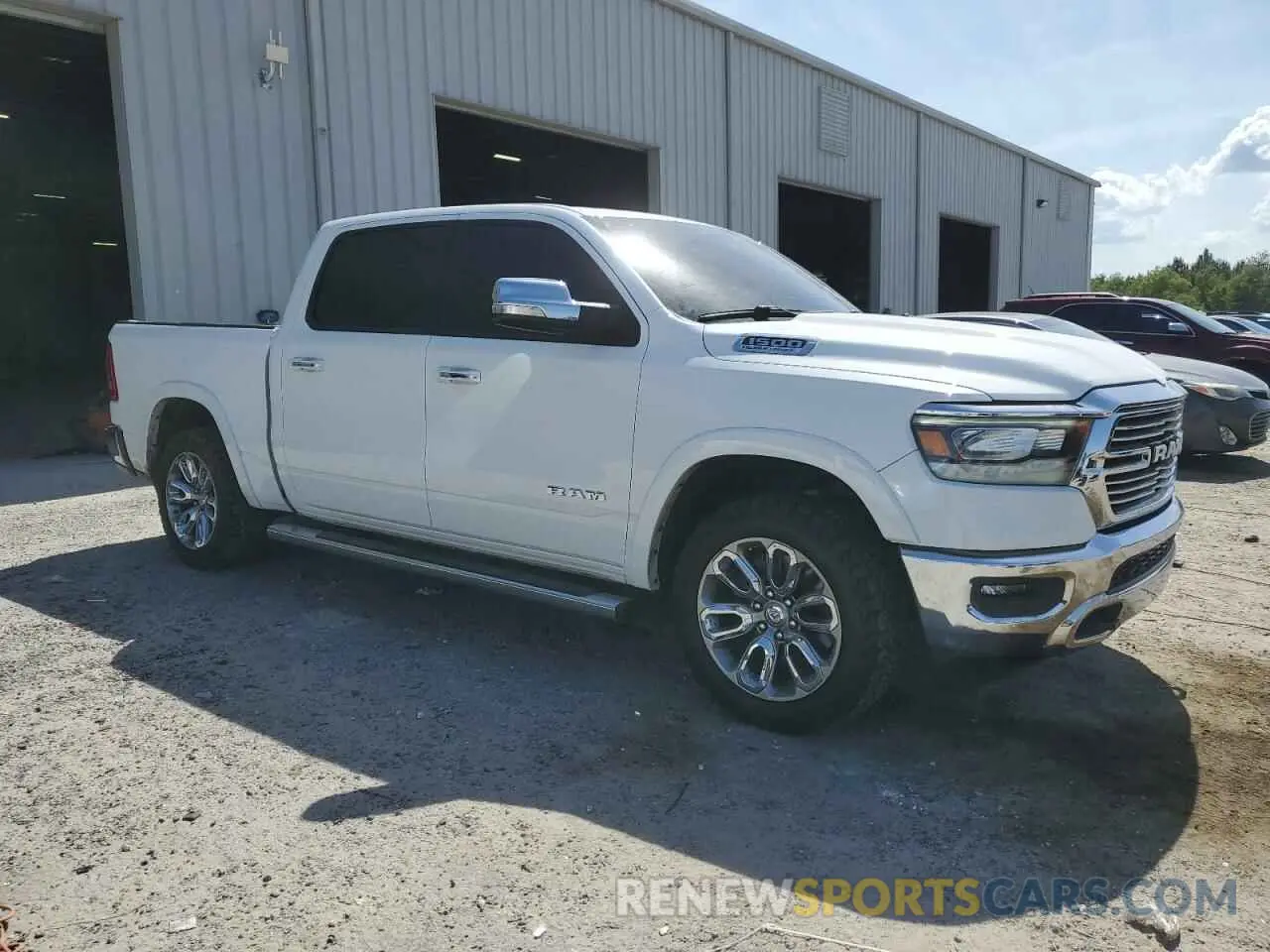 4 Photograph of a damaged car 1C6SRFJT3MN654873 RAM 1500 2021