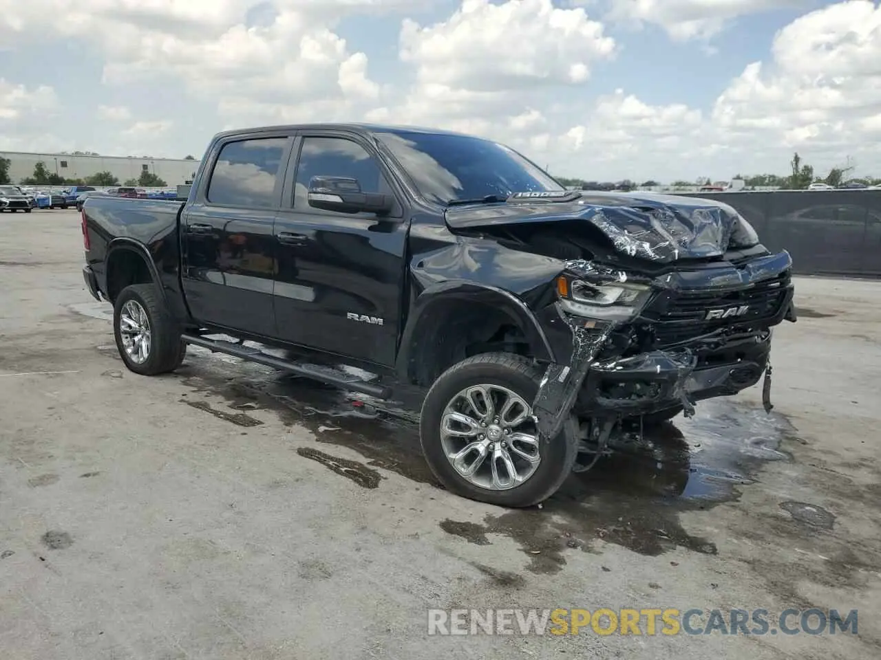 4 Photograph of a damaged car 1C6SRFJT3MN792252 RAM 1500 2021
