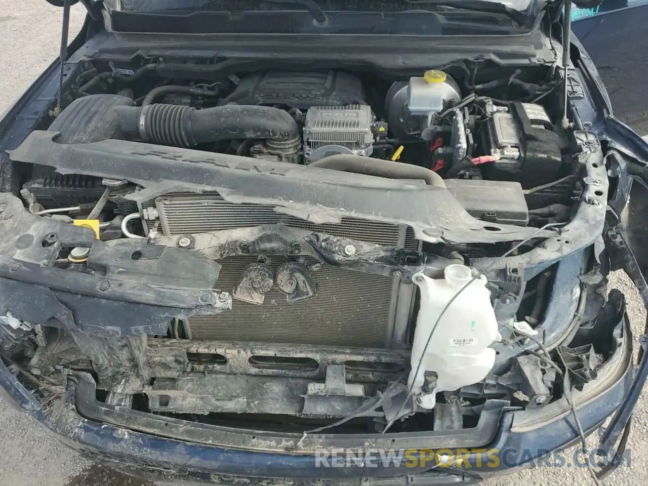 11 Photograph of a damaged car 1C6SRFJT3MN808479 RAM 1500 2021