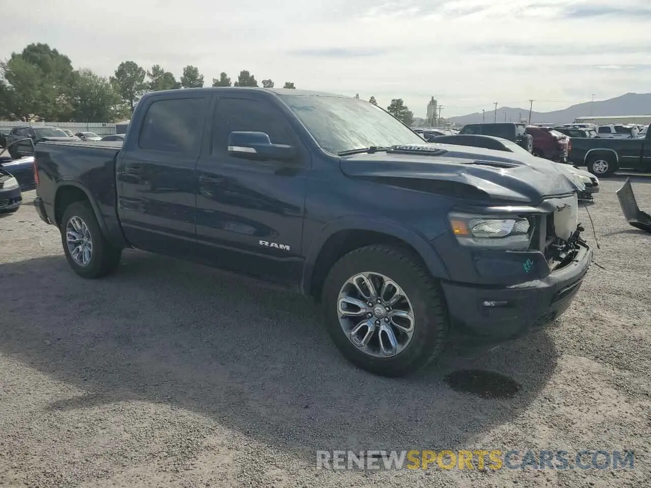 4 Photograph of a damaged car 1C6SRFJT3MN808479 RAM 1500 2021