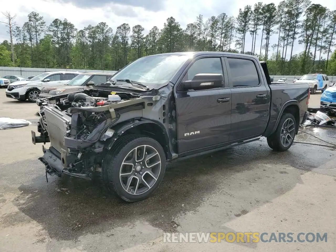 1 Photograph of a damaged car 1C6SRFJT4MN607299 RAM 1500 2021