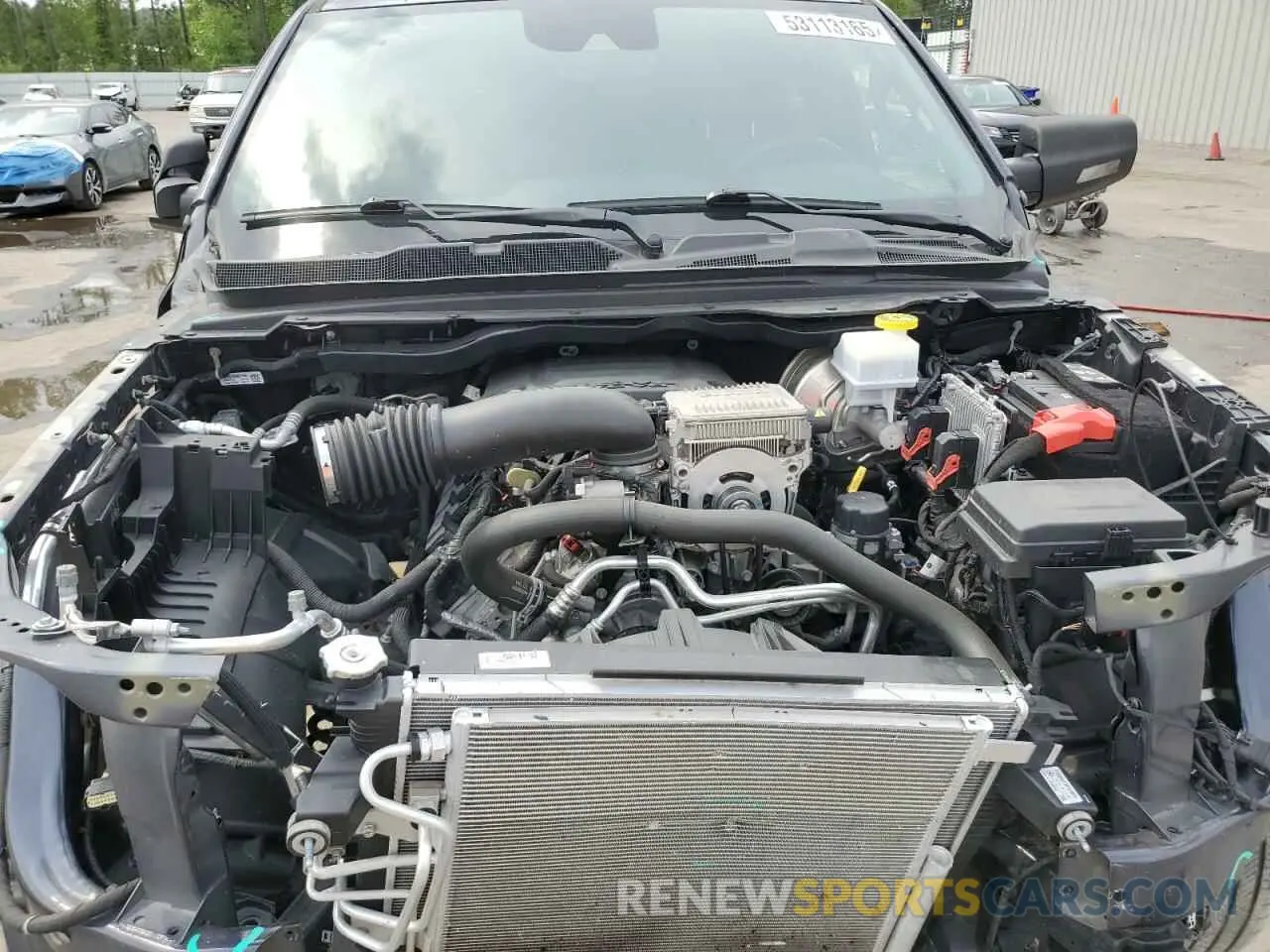 11 Photograph of a damaged car 1C6SRFJT4MN607299 RAM 1500 2021