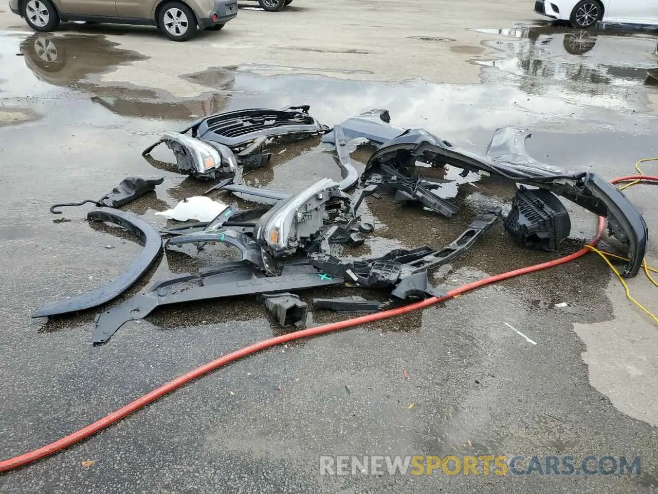 12 Photograph of a damaged car 1C6SRFJT4MN607299 RAM 1500 2021