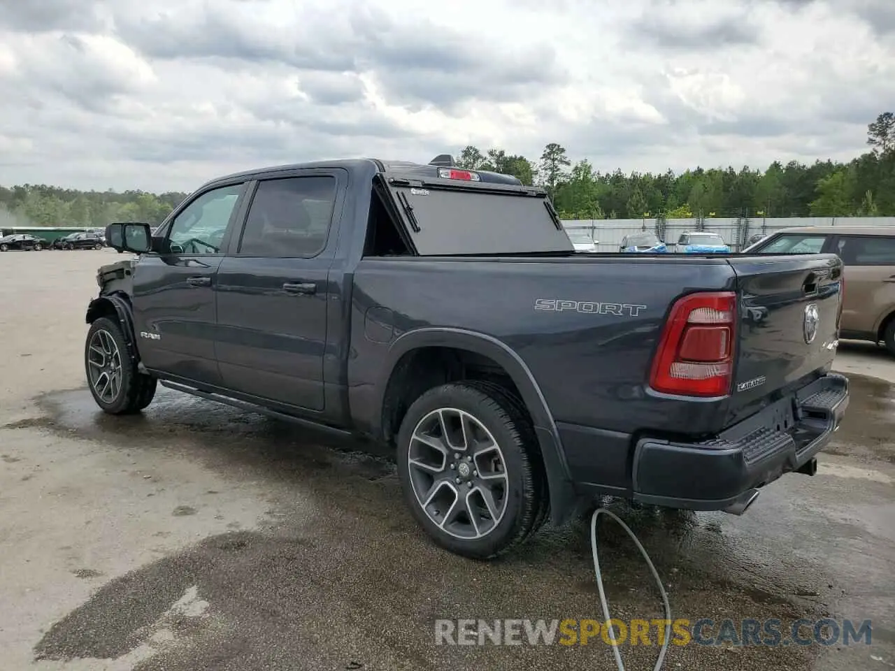 2 Photograph of a damaged car 1C6SRFJT4MN607299 RAM 1500 2021