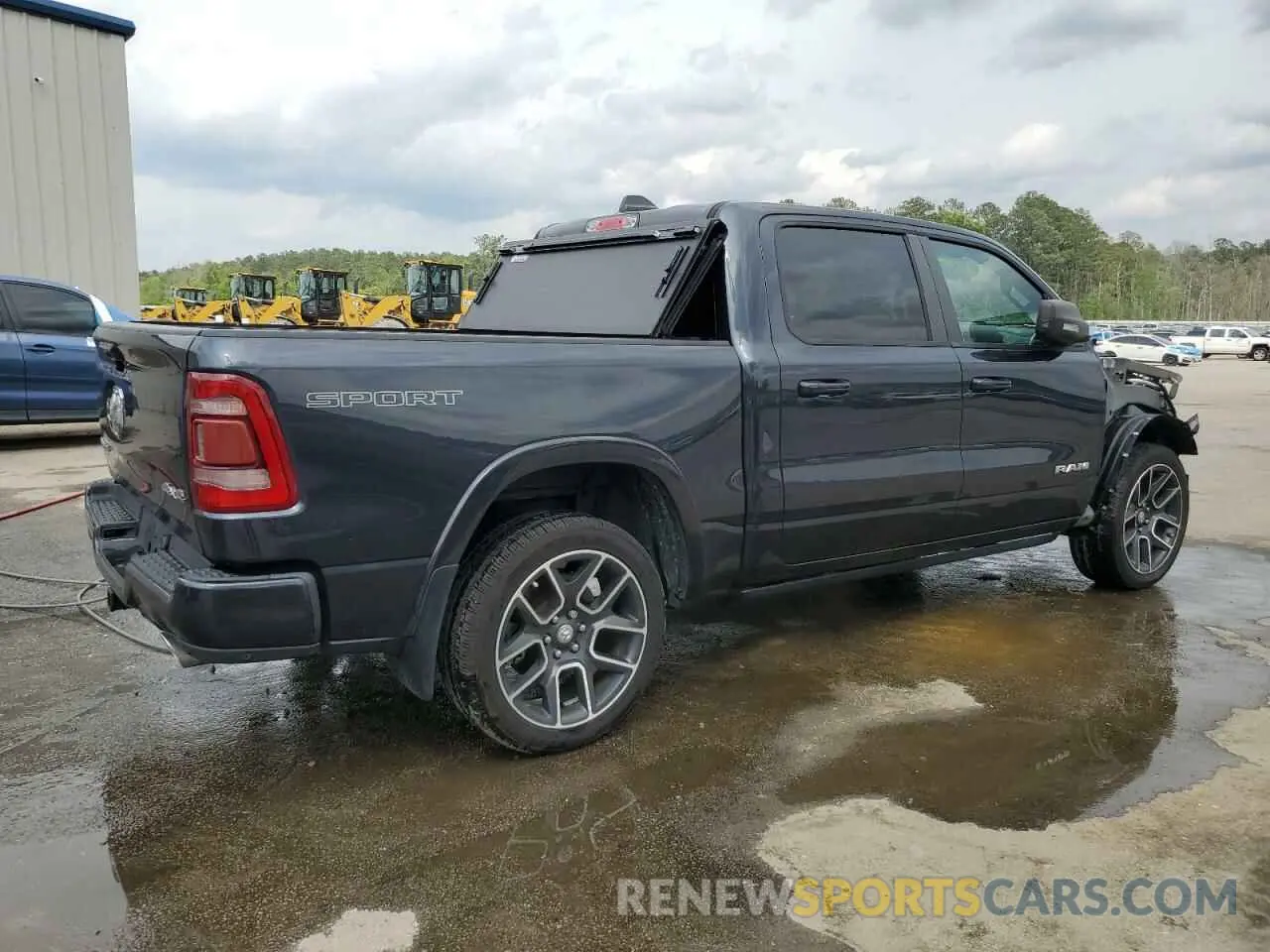 3 Photograph of a damaged car 1C6SRFJT4MN607299 RAM 1500 2021